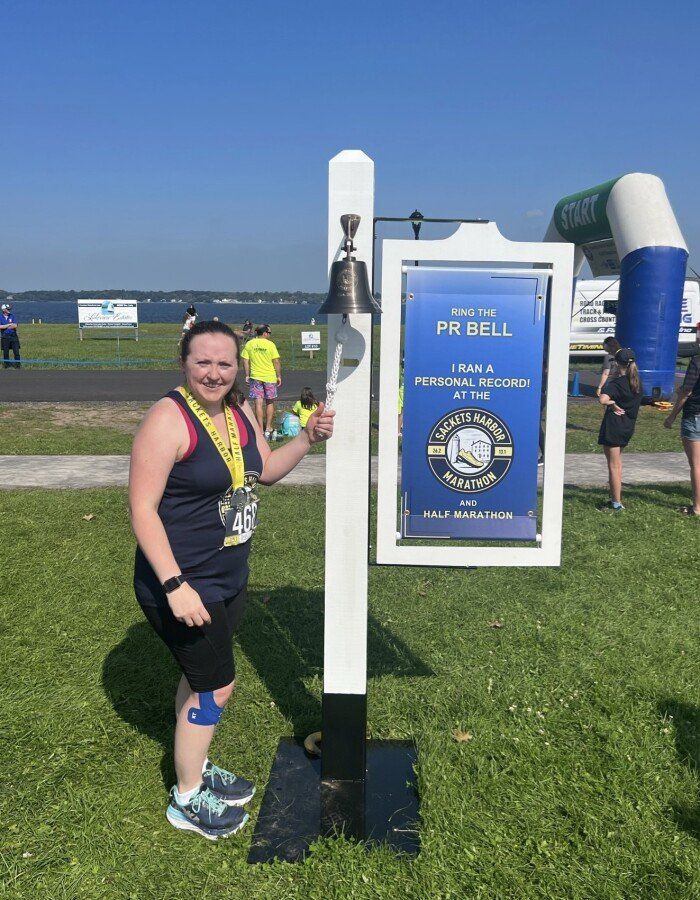 A finisher ringing the bell